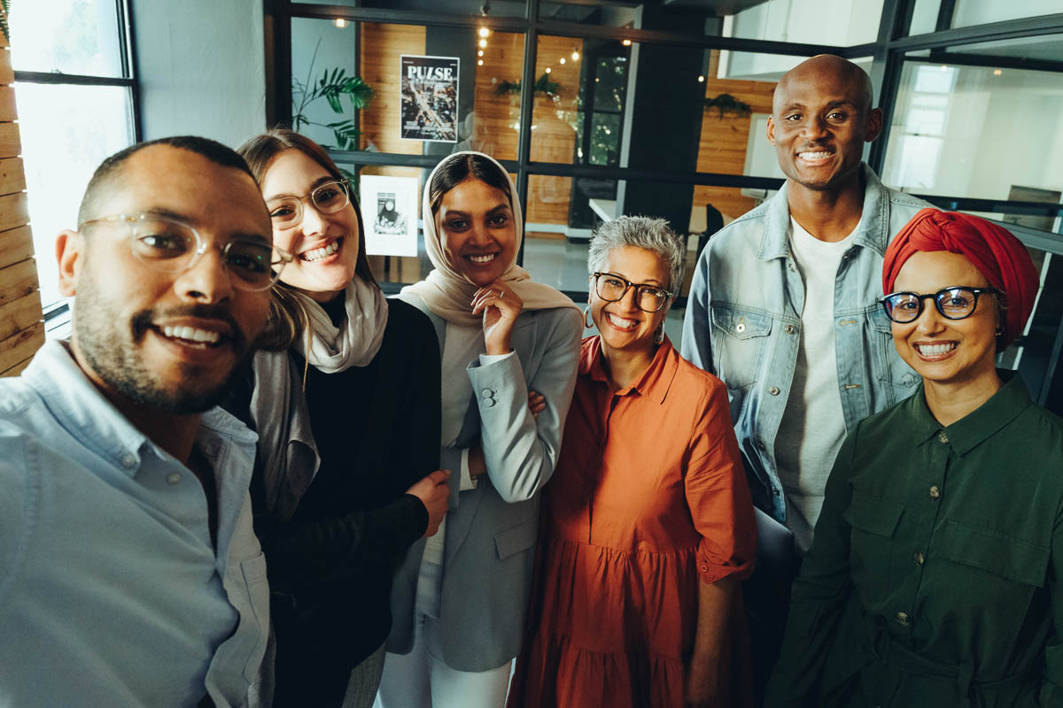 A diverse group of smiling business people